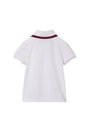 Polo in piquet di cotone elasticizzato bianco GUCCI KIDS | 805415XJGXV9250